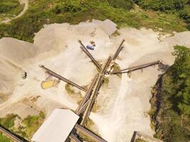 Bird eye view of sand mining conveyor from a height of 200 meters. Mining Industry. Panoramic Landscape. Graphic Resources. Above. Drone Photography. Aerial Landscape Photography Concept photo