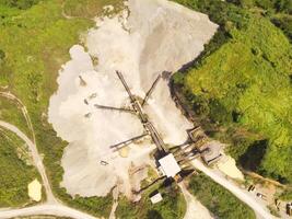 Bird eye view of sand mining conveyor from a height of 200 meters. Mining Industry. Panoramic Landscape. Graphic Resources. Above. Drone Photography. Aerial Landscape Photography Concept photo