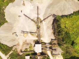 Bird eye view of sand mining conveyor from a height of 200 meters. Mining Industry. Panoramic Landscape. Graphic Resources. Above. Drone Photography. Aerial Landscape Photography Concept photo