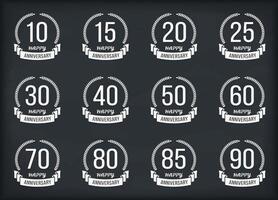 Set of 12 anniversary emblems with laurel wreaths and ribbons, 10 - 90 years vector