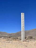 Obelisk with the Jujuy inscription in the Andes, Jujuy region, Argentina photo