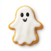 Halloween ghost shaped sugar cookie with white icing, isolated on white background, top view photo