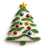Wide angle of a Christmas tree shaped cake with colorful ornaments isolated on white background photo