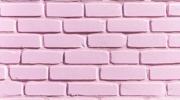 Abstract shot of a textured painted brick wall in pastel pink slightly faded color with subtle imperfections for a soft and nostalgic design concept photo
