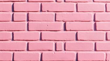 Abstract shot of a textured painted brick wall in pastel pink slightly faded color with subtle imperfections for a soft and nostalgic design concept photo