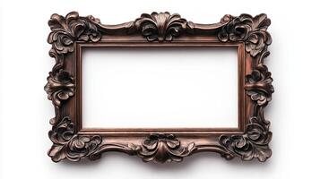 Close up of a small intricately detailed vintage picture frame with floral motifs and an aged bronze finish isolated on a white background casting a soft shadow photo