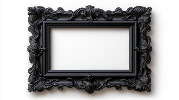 Overhead shot of a gothic picture frame with creepy designs like gargoyles and twisted branches finished in a matte black isolated on a white background photo