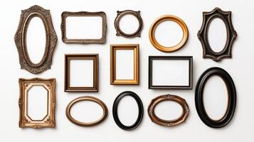 Overhead view of a collection of vintage ornate picture frames in various shapes including oval round and rectangular arranged on a white background empty and ready for use photo