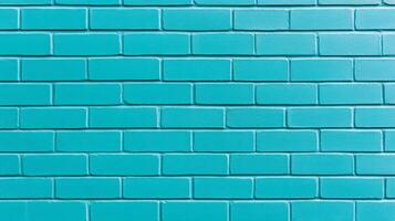 Closeup of a textured painted brick wall in vibrant turquoise showing rough brush strokes and slightly uneven coverage perfect for a bold and modern design aesthetic photo