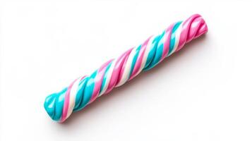 Isolated image of an unwrapped twisted bubble gum stick in bright neon colors lying on a smooth white background with a shadow effect photo