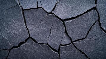 Macro shot of a raw concrete surface showing intricate pores and fine cracks rough texture with subtle shadow details monochromatic gray tones for industrial aesthetics photo