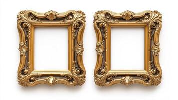 Wide angle shot of a pair of matching ornate picture frames with baroque style gold detailing isolated on a white background positioned side by side photo