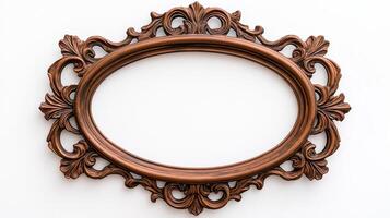 Wide angle shot of a vintage oval shaped picture frame with elaborate carvings and patina featuring baroque style scrolls and leaves isolated on a pure white background photo