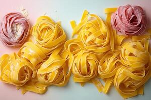 Fresh Homemade Pasta Noodles in Various Shapes and Colors on a Light Background photo