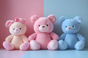 Adorable Trio of Plush Teddy Bears in Pastel Colors on Split Pink and Blue Background photo