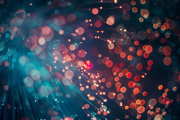 Abstract image featuring colorful bokeh lights with a blue hue, ideal for festive backgrounds