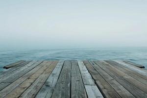 Serene wooden pier overlooking calm ocean horizon photo