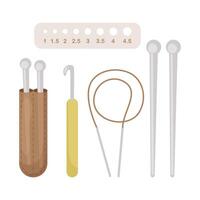 A set of knitting tools, needles, hook, ruler for determining the size of the needles. Illustration on white background. vector