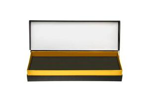 A small open black paper box with a yellow stripe for a gift. Gift wrapping isolate on white background. photo