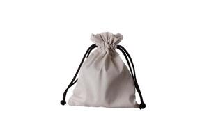 Small fabric pouch with a drawstring for tying. Isolate on a white back photo
