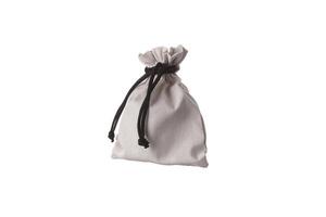 Small fabric pouch with a drawstring for tying. Isolate on a white back photo
