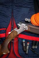 Background for creating a clay skeet shooting poster. Clay target plates for shooting with rifle on wooden background. photo