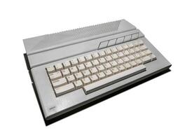 Vintage gray keyboard from a computer. Old office equipment. Computer technology of the past. Isolate on a white background. photo