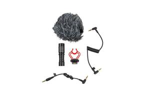 Small modern on-camera microphone with wind protection. Directional microphone. Audio recording tool. Isolate on a white back photo
