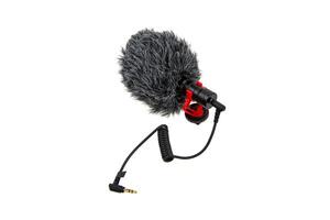 Small modern on-camera microphone with wind protection. Directional microphone. Audio recording tool. Isolate on a white back photo