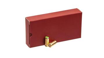 Box of cartridges for a traumatic gun isolate on a white back. Cartridges with rubber bullets for a traumatic gun. photo