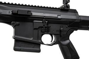 Modern automatic rifle isolated on white. Weapons for police, special forces and the army. Automatic carbine with mechanical sights. photo