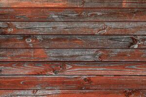 Vintage boards with the remnants of red paint photo