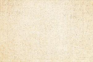 Natural Linen Material Textile Canvas Fabric Texture Background Close-up Detail of Fabric Natural Color Hemp Material Pattern Design Wallpaper. Can be Used as Background or For Graphic Design photo