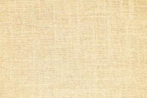 Natural Linen Material Textile Canvas Fabric Texture Background Close-up Detail of Fabric Natural Color Hemp Material Pattern Design Wallpaper. Can be Used as Background or For Graphic Design photo