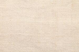Natural Linen Material Textile Canvas Fabric Texture Background Close-up Detail of Fabric Natural Color Hemp Material Pattern Design Wallpaper. Can be Used as Background or For Graphic Design photo