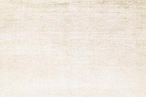 Natural Linen Material Textile Canvas Fabric Texture Background Close-up Detail of Fabric Natural Color Hemp Material Pattern Design Wallpaper. Can be Used as Background or For Graphic Design photo