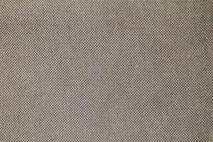 Natural Linen Material Textile Canvas Fabric Texture Background Close-up Detail of Fabric Natural Color Hemp Material Pattern Design Wallpaper. Can be Used as Background or For Graphic Design photo