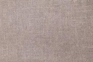 Natural Linen Material Textile Canvas Fabric Texture Background Close-up Detail of Fabric Natural Color Hemp Material Pattern Design Wallpaper. Can be Used as Background or For Graphic Design photo