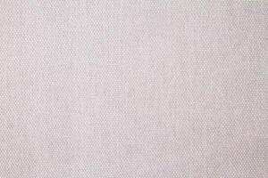 Natural Linen Material Textile Canvas Fabric Texture Background Close-up Detail of Fabric Natural Color Hemp Material Pattern Design Wallpaper. Can be Used as Background or For Graphic Design photo