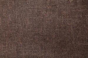 Natural Linen Material Textile Canvas Fabric Texture Background Close-up Detail of Fabric Natural Color Hemp Material Pattern Design Wallpaper. Can be Used as Background or For Graphic Design photo