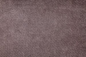 Natural Linen Material Textile Canvas Fabric Texture Background Close-up Detail of Fabric Natural Color Hemp Material Pattern Design Wallpaper. Can be Used as Background or For Graphic Design photo