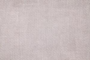 Natural Linen Material Textile Canvas Fabric Texture Background Close-up Detail of Fabric Natural Color Hemp Material Pattern Design Wallpaper. Can be Used as Background or For Graphic Design photo