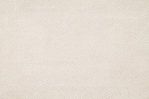 Natural Linen Material Textile Canvas Fabric Texture Background Close-up Detail of Fabric Natural Color Hemp Material Pattern Design Wallpaper. Can be Used as Background or For Graphic Design photo