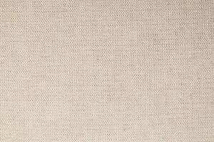 Natural Linen Material Textile Canvas Fabric Texture Background Close-up Detail of Fabric Natural Color Hemp Material Pattern Design Wallpaper. Can be Used as Background or For Graphic Design photo