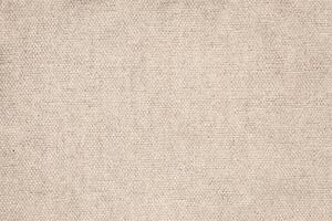 Natural Linen Material Textile Canvas Fabric Texture Background Close-up Detail of Fabric Natural Color Hemp Material Pattern Design Wallpaper. Can be Used as Background or For Graphic Design photo