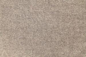 Natural Linen Material Textile Canvas Fabric Texture Background Close-up Detail of Fabric Natural Color Hemp Material Pattern Design Wallpaper. Can be Used as Background or For Graphic Design photo