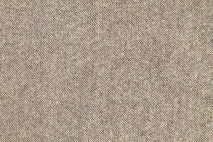 Natural Linen Material Textile Canvas Fabric Texture Background Close-up Detail of Fabric Natural Color Hemp Material Pattern Design Wallpaper. Can be Used as Background or For Graphic Design photo