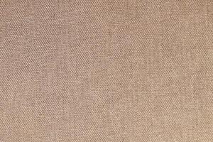 Natural Linen Material Textile Canvas Fabric Texture Background Close-up Detail of Fabric Natural Color Hemp Material Pattern Design Wallpaper. Can be Used as Background or For Graphic Design photo