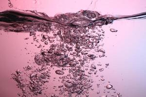 Fresh Water With Underwater Bubbles Texture on a Blue Background Close-up Abstract Liquid Bubbles Aqua Design Wallpaper photo