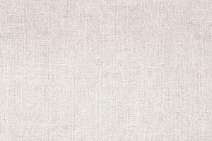 Natural Linen Material Textile Canvas Fabric Texture Background Close-up Detail of Fabric Natural Color Hemp Material Pattern Design Wallpaper. Can be Used as Background or For Graphic Design photo